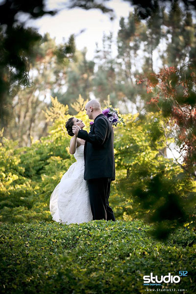 Amanda and Ian practice their wedding dance in the garden